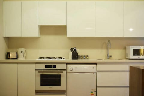 Deluxe Apartment, 2 Bedrooms | Private kitchen | Full-size fridge, microwave, oven, stovetop