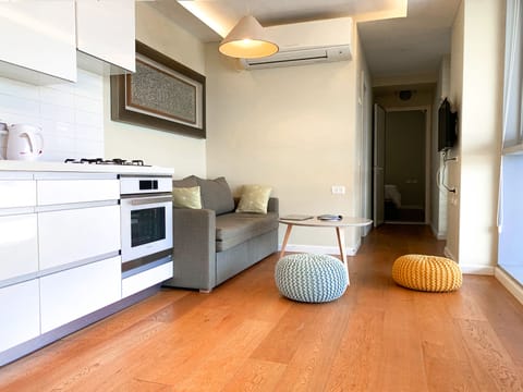 Comfort Apartment, 1 Bedroom | Living area | Flat-screen TV