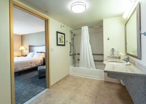 Room, 2 Queen Beds, Refrigerator & Microwave | Bathroom | Free toiletries, hair dryer, towels