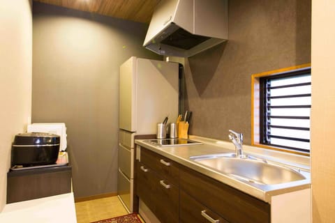 Penthouse Stay | Private kitchen | Fridge, microwave, stovetop, electric kettle
