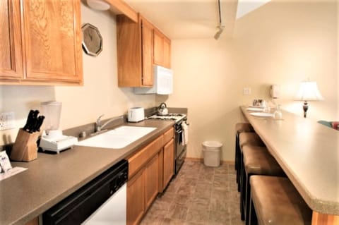 Family Condo, 1 Bedroom, Kitchenette (No A/C) | Private kitchen | Full-size fridge, microwave, stovetop, dishwasher