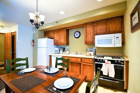 Family Condo, 1 Bedroom, Kitchenette (No A/C) | Private kitchen | Full-size fridge, microwave, stovetop, dishwasher