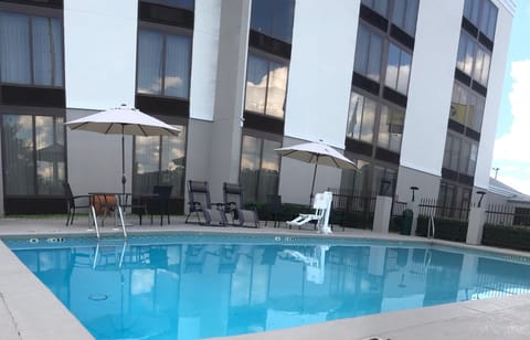 Seasonal outdoor pool, open 8:00 AM to 10:00 PM, sun loungers