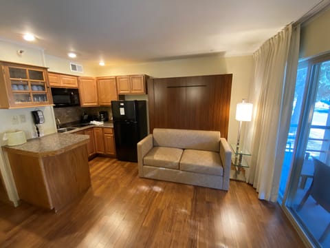 Suite, 1 Bedroom | Private kitchen | Fridge, microwave, stovetop, dishwasher