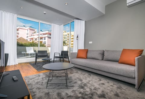 Premium Suite, 2 Bedrooms, Terrace | Living area | TV
