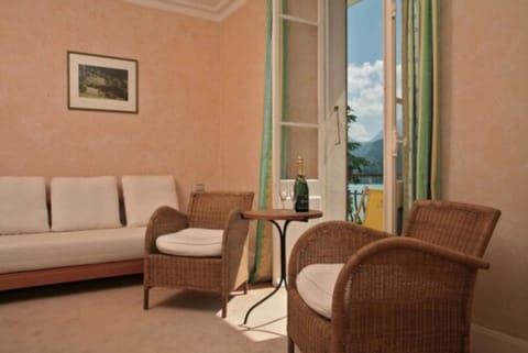 Junior Quadruple Room, Balcony, Lake View (Family) | Living area | Flat-screen TV