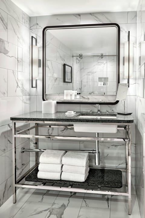 Combined shower/tub, hair dryer, bathrobes, towels