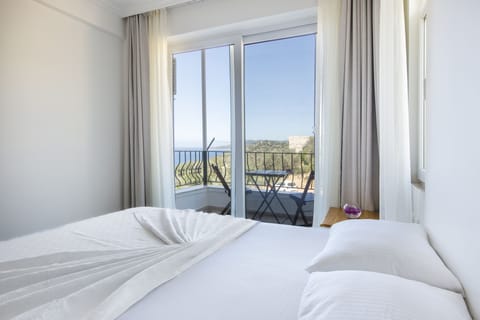 Deluxe Room, 1 Queen Bed with Sofa bed, Partial Sea View | In-room safe, free WiFi, bed sheets