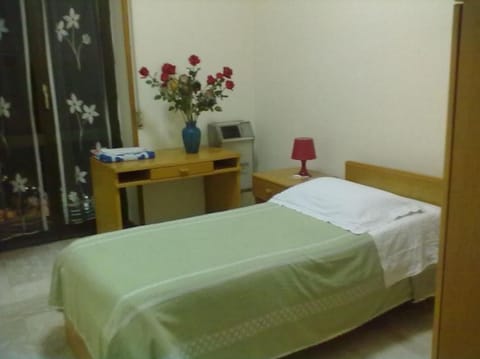 Single Room | Desk, iron/ironing board, rollaway beds