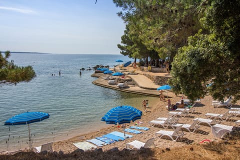 Beach nearby, sun loungers, beach umbrellas, beach towels