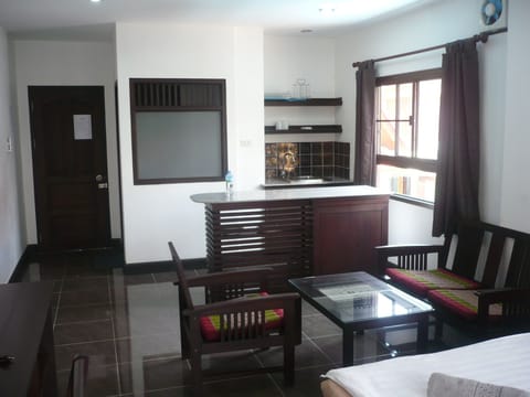 Superior Double Room (Front Side) | Living area | Flat-screen TV