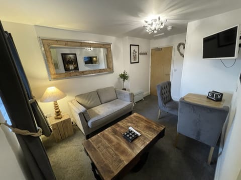 Apartment | Living area | 42-cm flat-screen TV with digital channels, TV