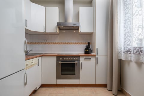 One Bedroom Apartment 4 Adults | Private kitchen | Fridge, microwave, oven, stovetop