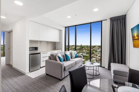 1 Bedroom Suite City View | Living area | 48-inch flat-screen TV with cable channels