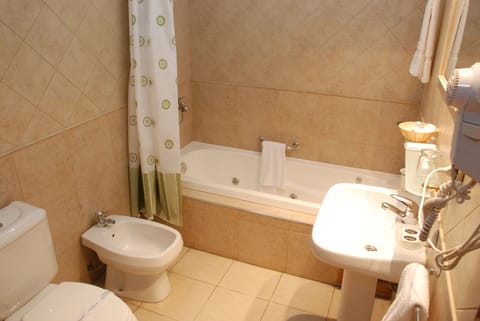 Standard Double Room | Bathroom | Combined shower/tub, hair dryer, bidet, towels