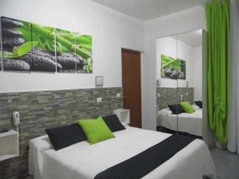 Basic Triple Room, 1 Bedroom | Down comforters, in-room safe, desk, free WiFi