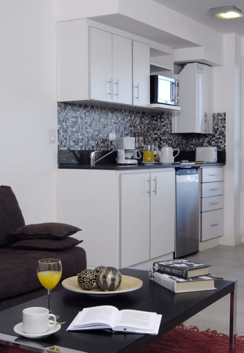 Apartment, 1 Bedroom | Private kitchen | Fridge, microwave, stovetop, coffee/tea maker