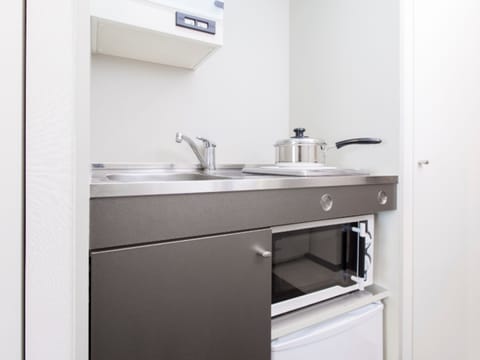 Mini-fridge, microwave, paper towels