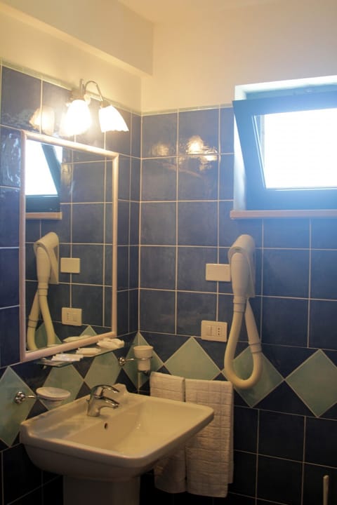 Double Room | Bathroom | Shower, hair dryer, bidet, towels