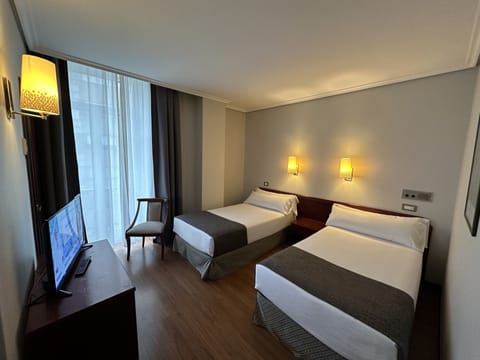 Standard Double or Twin Room | Desk, blackout drapes, free WiFi, bed sheets