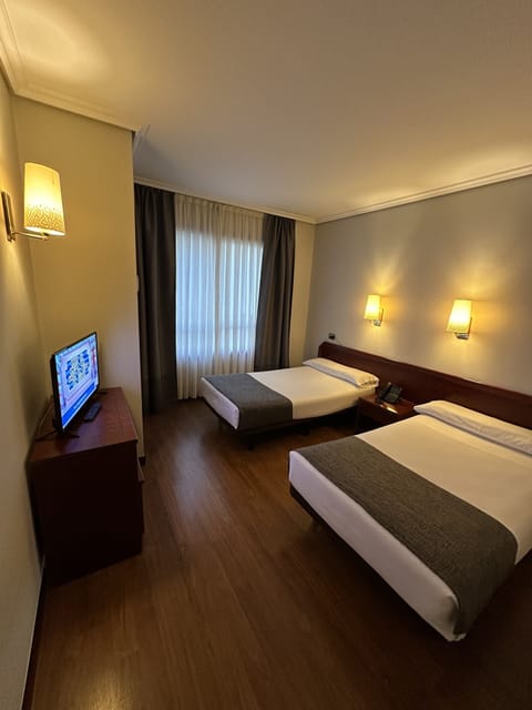 Standard Double or Twin Room | Desk, blackout drapes, free WiFi, bed sheets