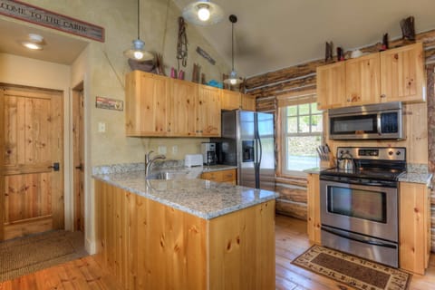 Full Kitchen with stainless appliances, everything for all of your cooking needs
