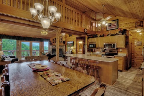 Spacious open kitchen with large granite Island, plenty of seating