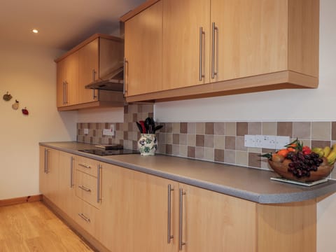 Cottage | Private kitchen | Stovetop, dishwasher, highchair, cookware/dishes/utensils