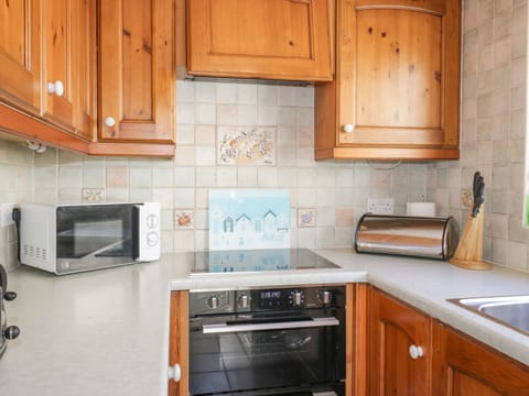 Cottage | Private kitchen | Highchair, cookware/dishes/utensils