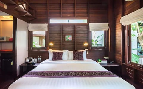 Wooden Bungalow | Select Comfort beds, minibar, in-room safe, desk