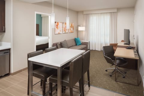 Suite, 1 Bedroom | Desk, blackout drapes, iron/ironing board, free cribs/infant beds