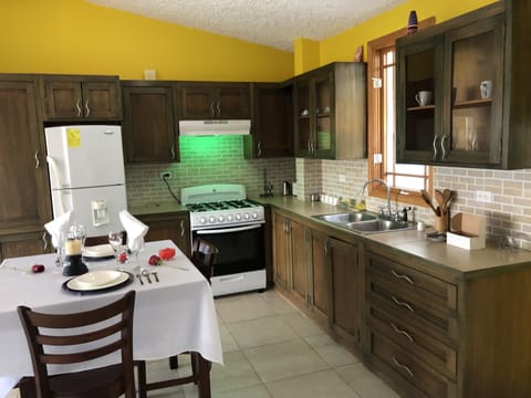 Grand Room, 1 Bedroom, Bathtub, Pool View | Private kitchen | Oven, stovetop, coffee/tea maker, kitchen islands