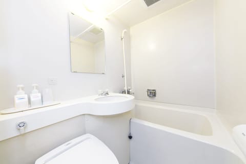 Combined shower/tub, free toiletries, hair dryer, bathrobes