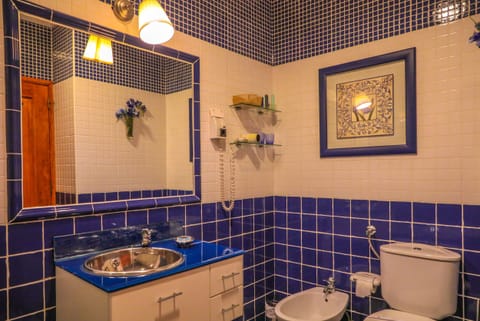 Double or Twin Room (Blue) | Bathroom | Bathtub, free toiletries, hair dryer, bidet