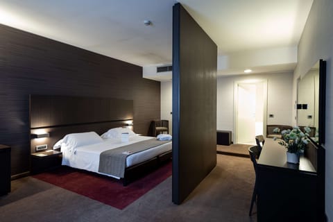 Suite, 1 King Bed | Premium bedding, down comforters, minibar, in-room safe