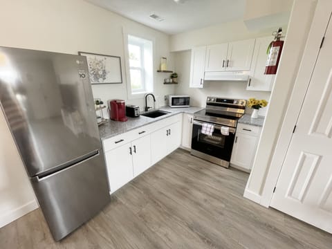 Family Suite, 2 Bedrooms, Kitchen, Bay View | Private kitchen | Full-size fridge, coffee/tea maker, electric kettle, coffee grinder