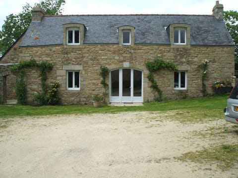 gite facade overlooking farm courtyard