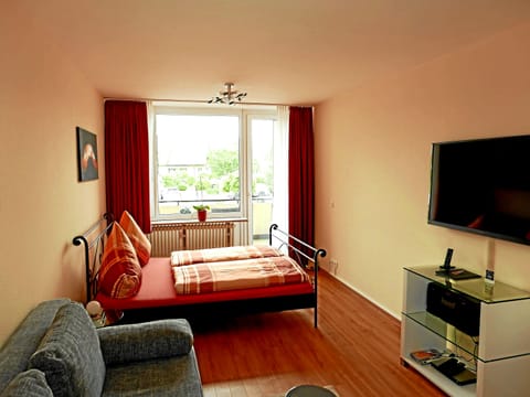 Apartment, 1 Bedroom, Non Smoking, Kitchenette | Living area | 107-cm flat-screen TV with cable channels, TV, DVD player