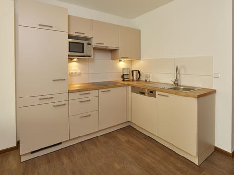 Apartment, 2 Bedrooms | Private kitchen | Full-size fridge, microwave, stovetop, dishwasher