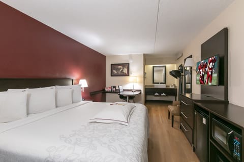 Premium Room, 1 King Bed (Upgraded Bedding & Snack, Smoke Free) | Pillowtop beds, desk, blackout drapes, free WiFi