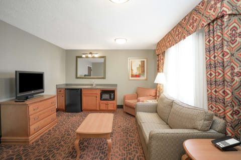 Suite, 1 King Bed, Non Smoking | In-room safe, iron/ironing board, free cribs/infant beds, rollaway beds