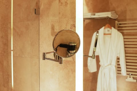 Combined shower/tub, eco-friendly toiletries, hair dryer, bathrobes