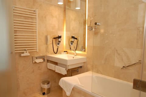 Combined shower/tub, eco-friendly toiletries, hair dryer, bathrobes
