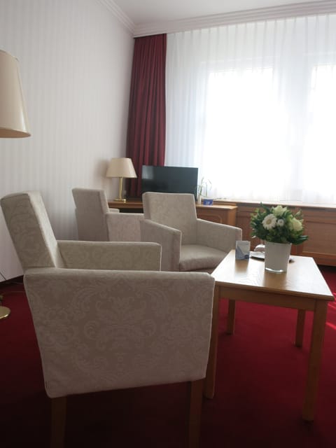 Double Room | Living area | Flat-screen TV