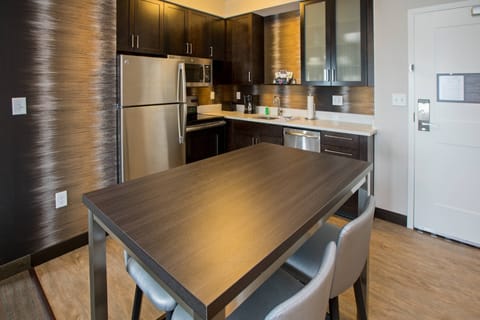 Suite, 2 Bedrooms | Private kitchen | Full-size fridge, microwave, oven, stovetop