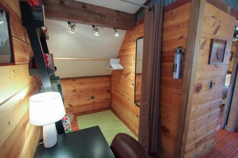 Curtains can be closed for a private closet / changing area