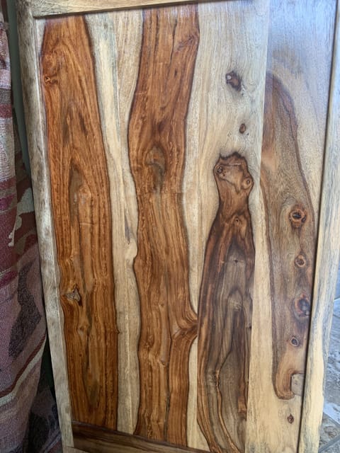 Master bedroom furniture is Rosewood from India