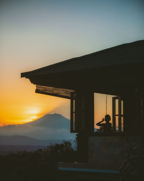 Sunset views behind the Java volcanoes from your lounge area can be spectacular
