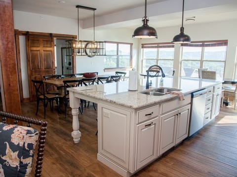 We love the large island for lots of work space and dining space too!!  