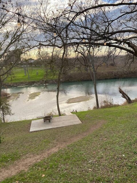 Walkway to the river and fire pit.